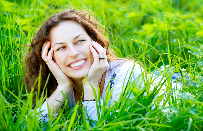 Image of Woman Smiling In Meadow